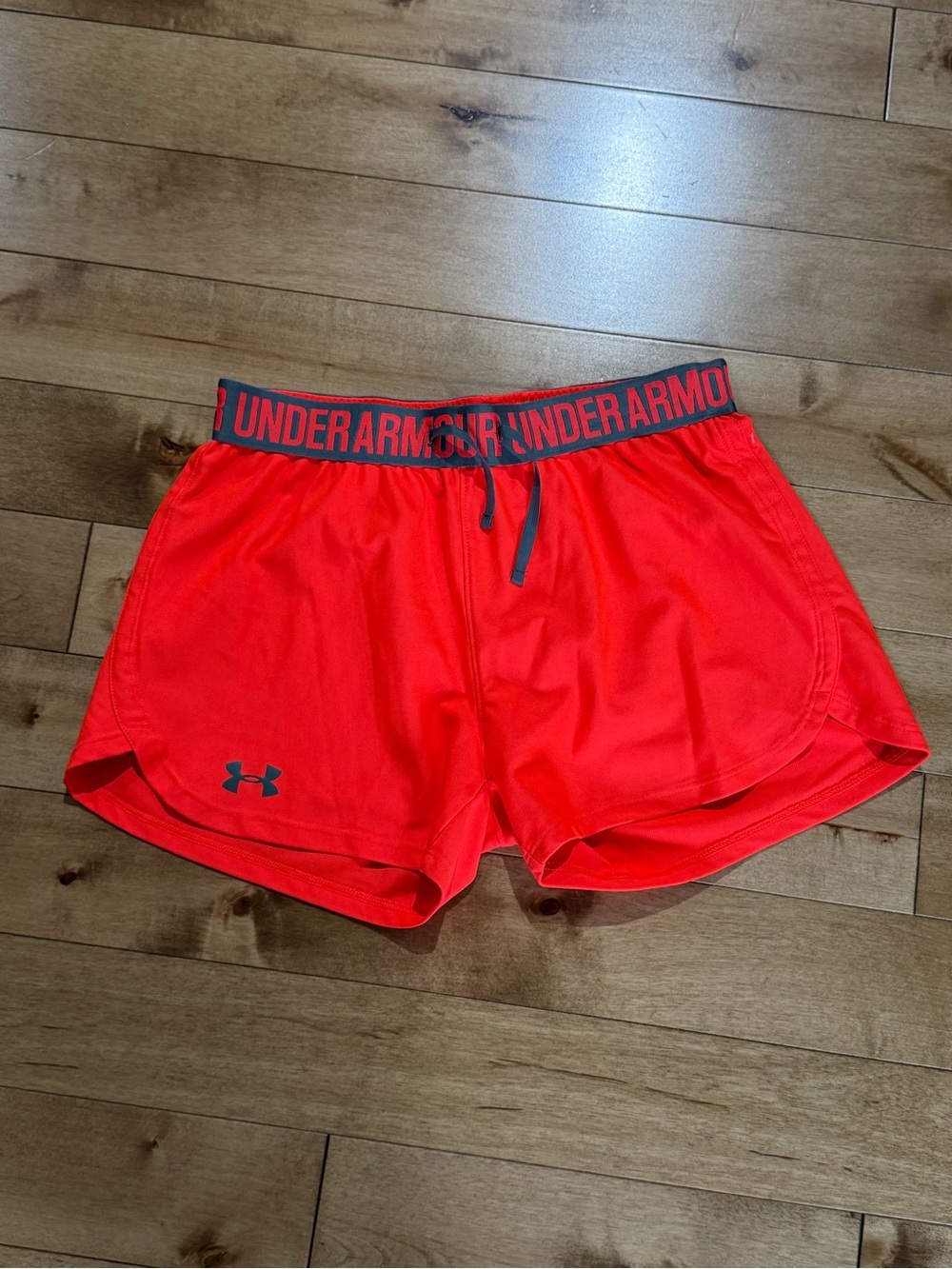 Under Armour Women’s neon bright orange Athletic Shorts XS